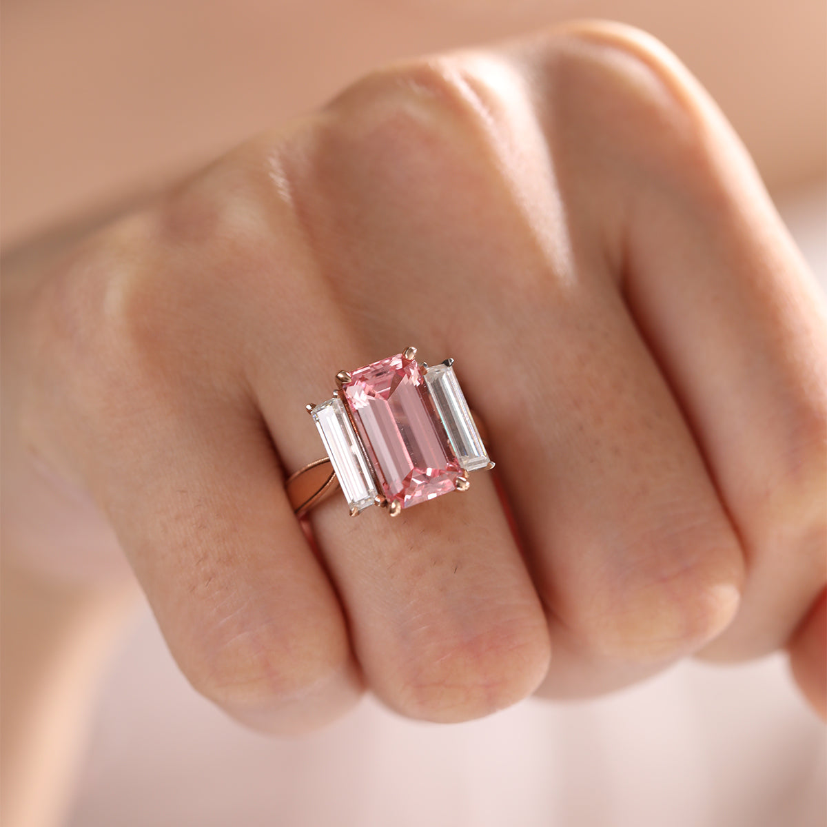 14K Rose and White Gold 13*6.5mm Emerald Cut Lab Pink Sapphire and Two Baguette Cut Lab Diamond Three Stone Cocktail Ring with Tapered Band 14K Rose and White Gold 13*6.5mm Emerald Cut Lab Pink Sapphire and Two Baguette Cut Lab Diamond Three Stone Cocktail Ring with Tapered Band