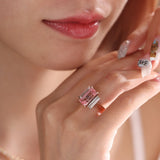 14K Rose and White Gold 13*6.5mm Emerald Cut Lab Pink Sapphire and Two Baguette Cut Lab Diamond Three Stone Cocktail Ring with Tapered Band 14K Rose and White Gold 13*6.5mm Emerald Cut Lab Pink Sapphire and Two Baguette Cut Lab Diamond Three Stone Cocktail Ring with Tapered Band