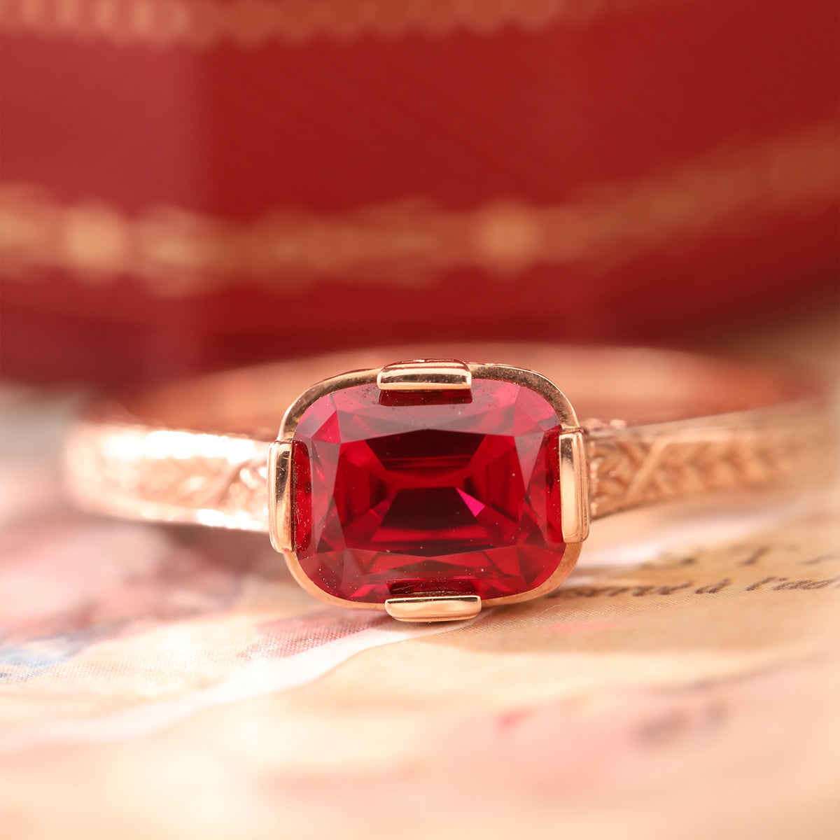 14K Rose Gold 1ct Elongated Cushion Pigeon Blood Lab Ruby Half Bezel Solitaire Ring 14K Rose Gold 1ct Elongated Cushion Pigeon Blood Lab Ruby Half Bezel Solitaire Ring