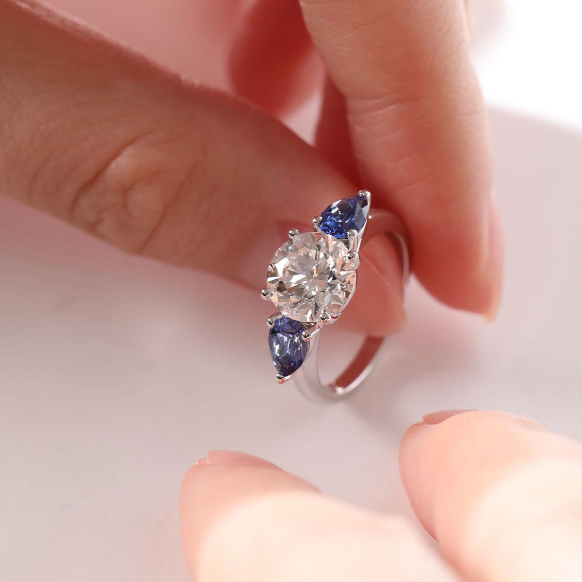 18K White Gold Round Lab Diamond Pear Sapphire Three Stone Ring 18K White Gold Round Lab Diamond Pear Sapphire Three Stone Ring