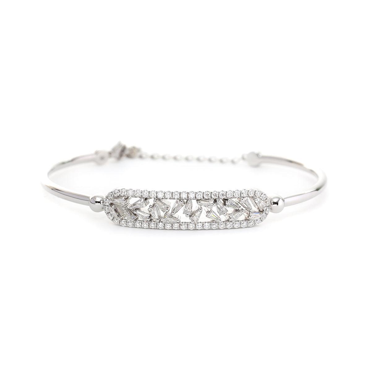 14K White Gold Cuff Bangle Bracelet with Tapered Baguette Cut and Round Cut Diamonds 14K White Gold Cuff Bangle Bracelet with Tapered Baguette Cut and Round Cut Diamonds