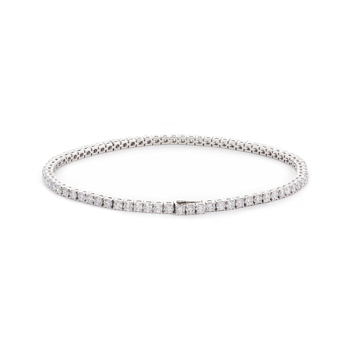 Platinum Round Brilliant Cut Diamond 4 Prong Basket Tennis Bracelet Platinum Round Brilliant Cut Diamond 4 Prong Basket Tennis Bracelet