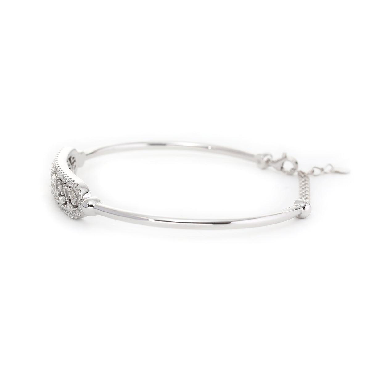 14K White Gold Cuff Bangle Bracelet with Tapered Baguette Cut and Round Cut Diamonds 14K White Gold Cuff Bangle Bracelet with Tapered Baguette Cut and Round Cut Diamonds
