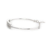 14K White Gold Cuff Bangle Bracelet with Tapered Baguette Cut and Round Cut Diamonds 14K White Gold Cuff Bangle Bracelet with Tapered Baguette Cut and Round Cut Diamonds