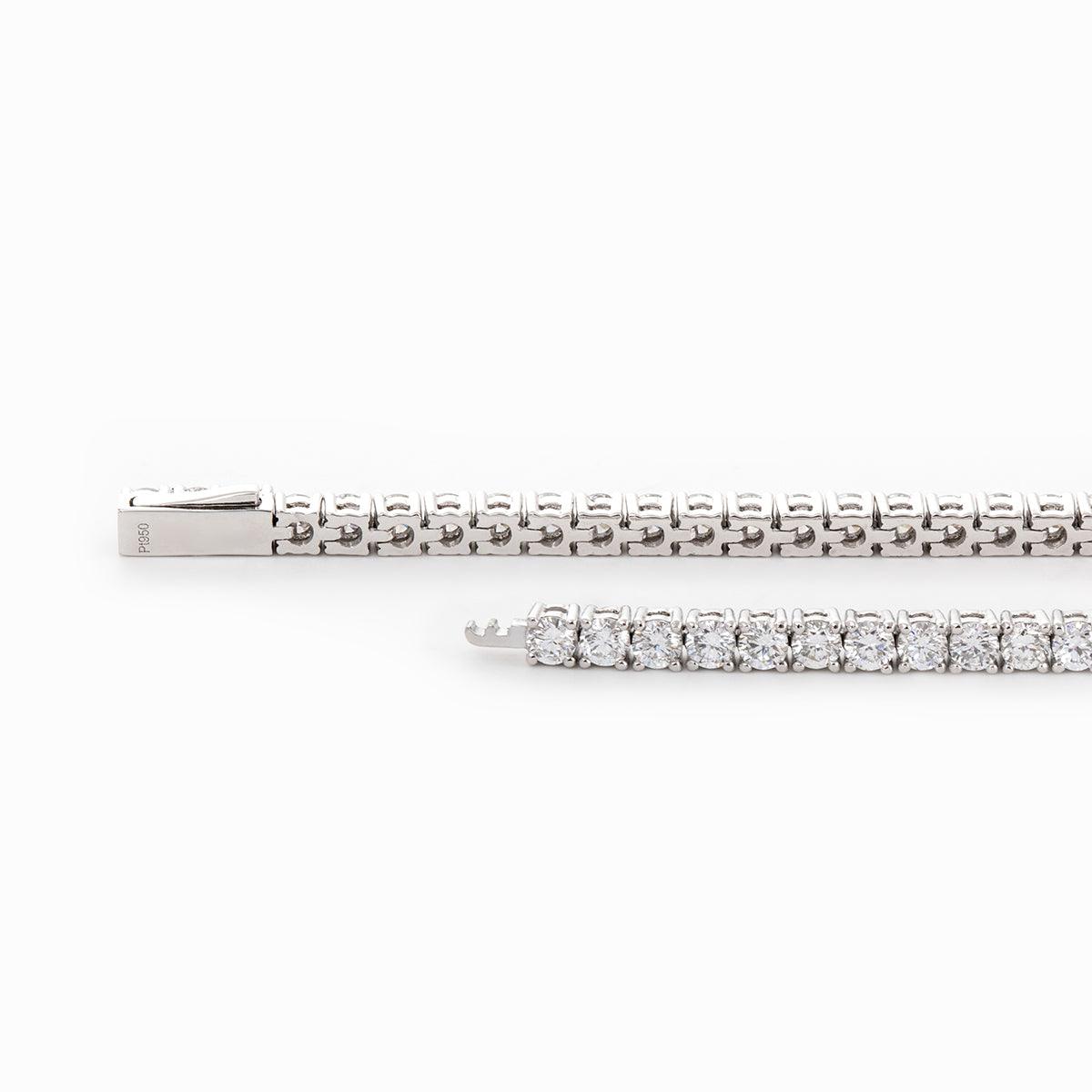 Platinum Round Brilliant Cut Diamond 4 Prong Basket Tennis Bracelet Platinum Round Brilliant Cut Diamond 4 Prong Basket Tennis Bracelet