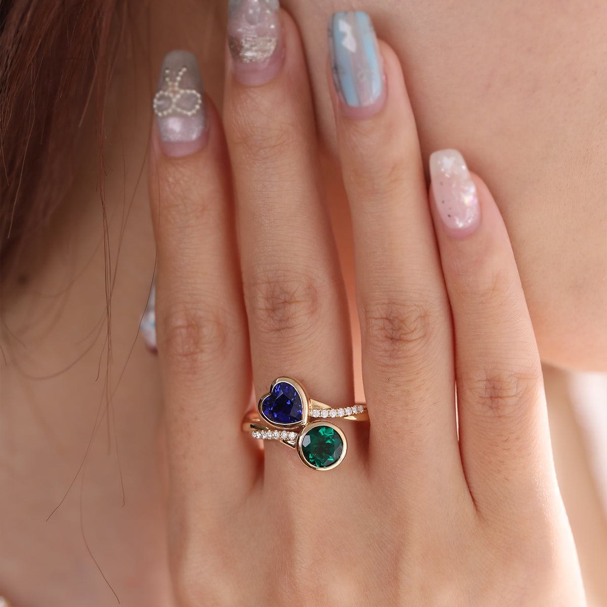 14K Yellow Gold Heart Lab Sapphire and Round Zambian Lab Emerald Toi et Moi Ring with Twist Band 14K Yellow Gold Heart Lab Sapphire and Round Zambian Lab Emerald Toi et Moi Ring with Twist Band