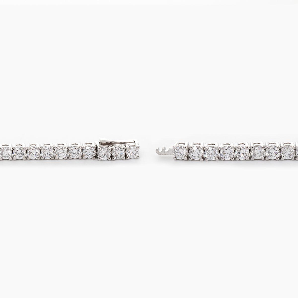 Platinum Round Brilliant Cut Diamond 4 Prong Basket Tennis Bracelet Platinum Round Brilliant Cut Diamond 4 Prong Basket Tennis Bracelet