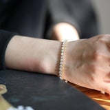 18K Yellow Gold Round Brilliant Cut Lab Diamond 4 Prong Basket Tennis Bracelet 18K Yellow Gold Round Brilliant Cut Lab Diamond 4 Prong Basket Tennis Bracelet