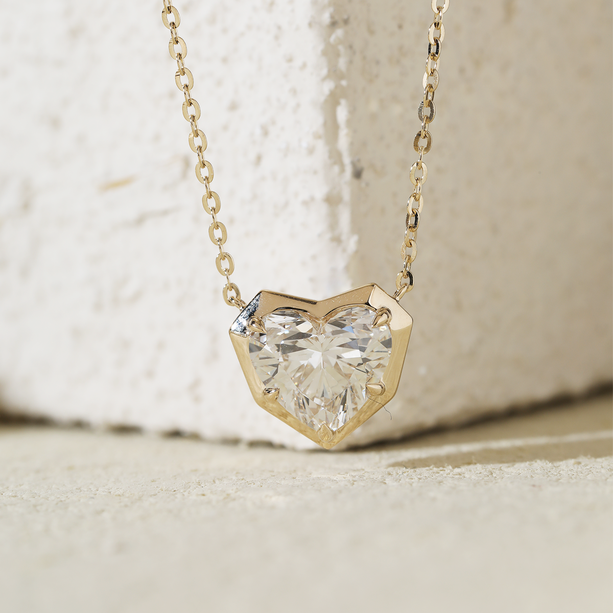 14K Yellow Gold Necklace with 2.5ct Heart Shaped Lab Diamond Pendant in Bezel Setting and Round Cross Chain 14K Yellow Gold Necklace with 2.5ct Heart Shaped Lab Diamond Pendant in Bezel Setting and Round Cross Chain