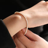 18K Yellow Gold Round Brilliant Cut Lab Diamond Three Prong Tennis Bracelet 18K Yellow Gold Round Brilliant Cut Lab Diamond Three Prong Tennis Bracelet