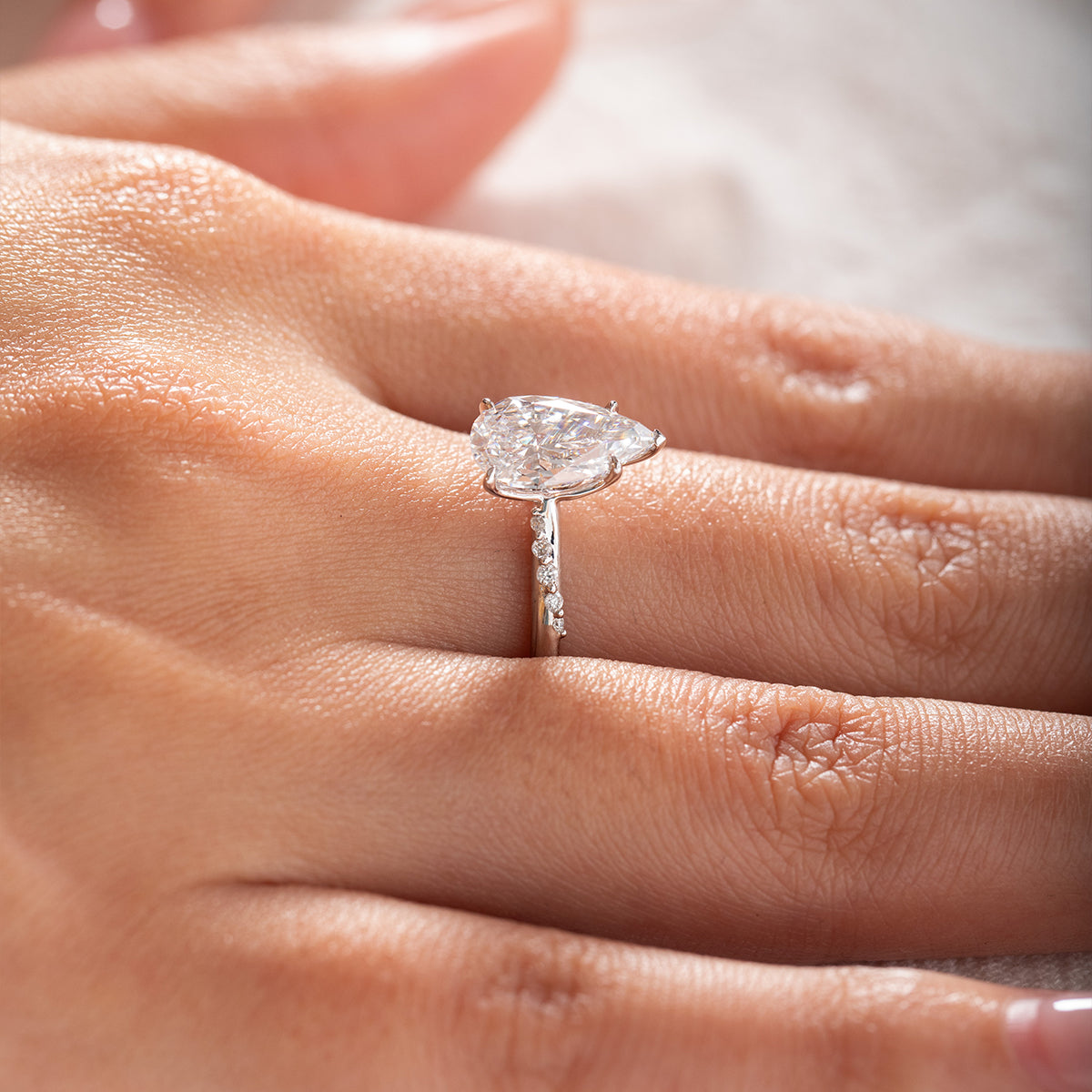 14K White Gold 2ct Pear Cut Lab Diamond Ring with Twist Pave Band and Floral Basket Head Design 14K White Gold 2ct Pear Cut Lab Diamond Ring with Twist Pave Band and Floral Basket Head Design