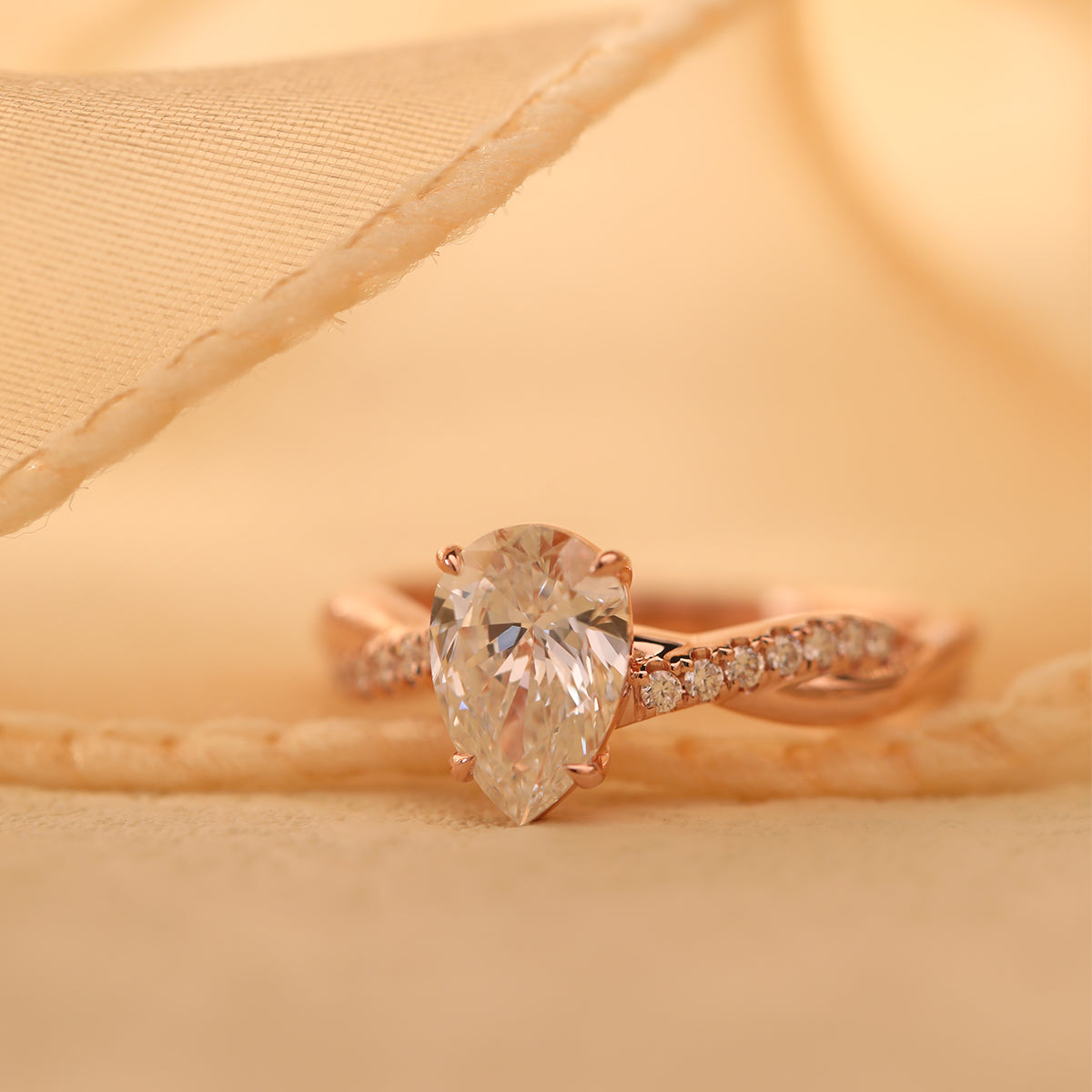 14K Rose Gold 1.5ct Pear Cut Lab Diamond Twist Pave Ring 14K Rose Gold 1.5ct Pear Cut Lab Diamond Twist Pave Ring