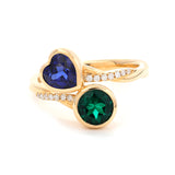 14K Yellow Gold Heart Lab Sapphire and Round Zambian Lab Emerald Toi et Moi Ring with Twist Band 14K Yellow Gold Heart Lab Sapphire and Round Zambian Lab Emerald Toi et Moi Ring with Twist Band