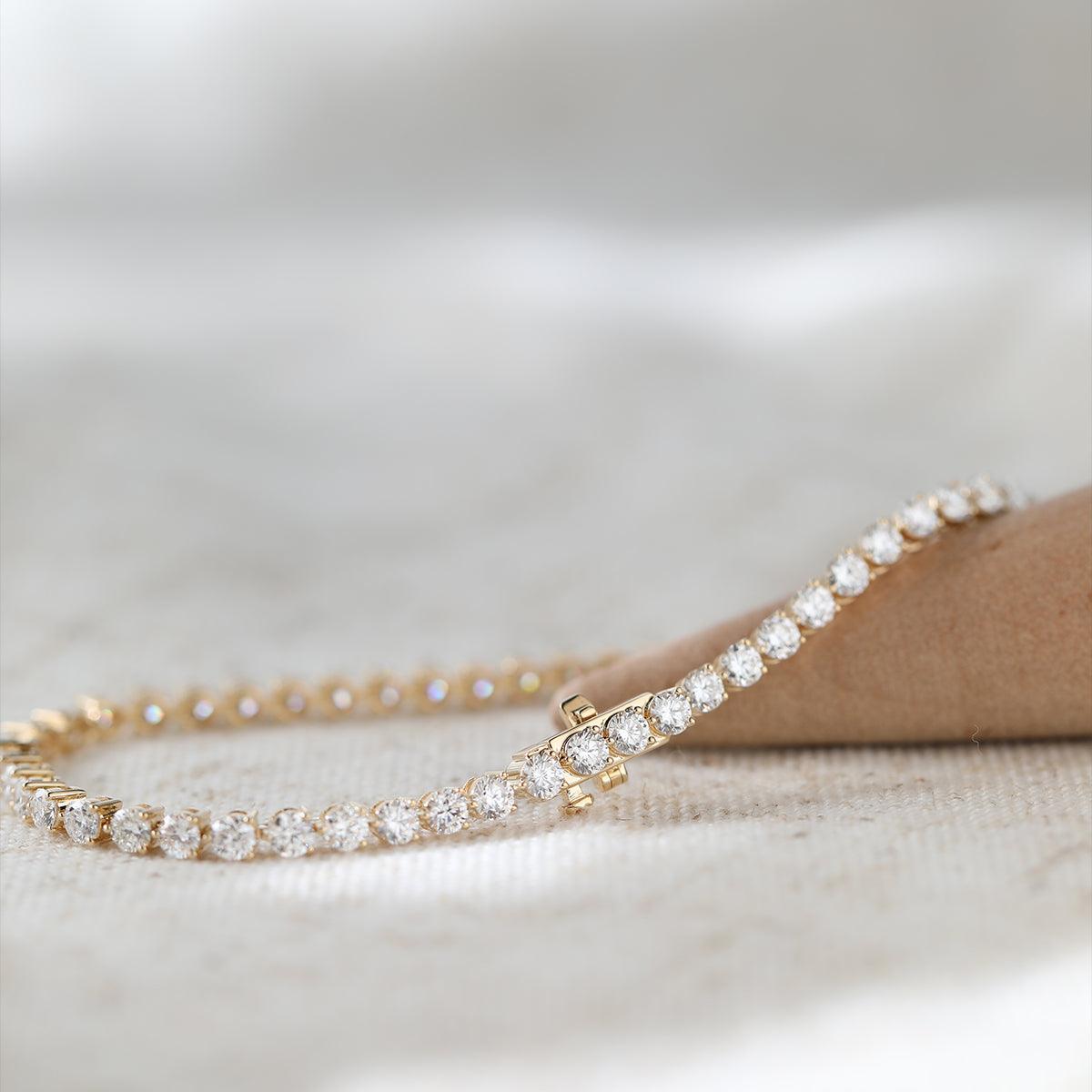 18K Yellow Gold Round Brilliant Cut Lab Diamond Three Prong Tennis Bracelet 18K Yellow Gold Round Brilliant Cut Lab Diamond Three Prong Tennis Bracelet