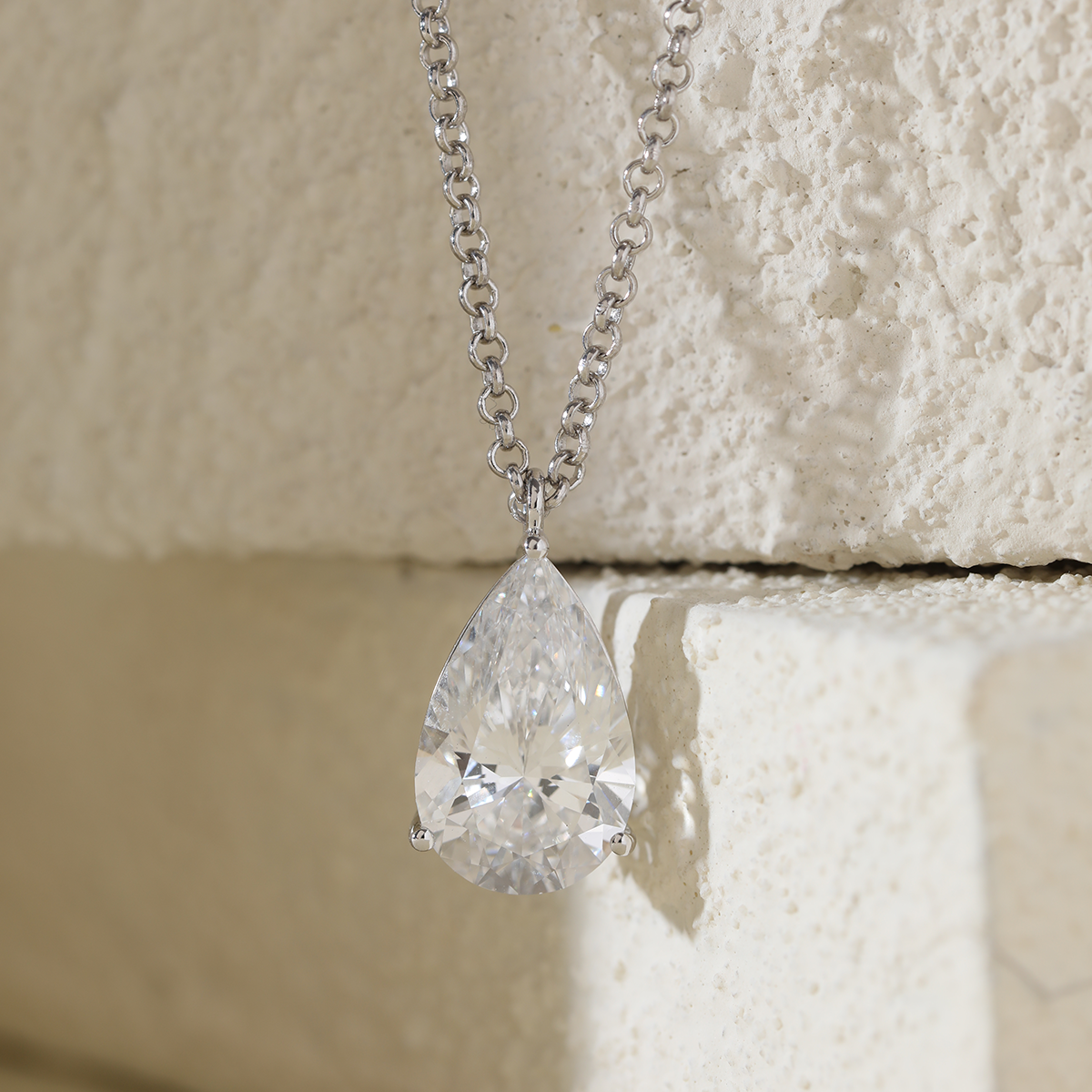14K White Gold Necklace with 6ct Pear Shaped Lab Diamond Pendant in 3 Prong Basket Setting and Rolo Chain 14K White Gold Necklace with 6ct Pear Shaped Lab Diamond Pendant in 3 Prong Basket Setting and Rolo Chain