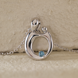 14K White Gold Mother and Child Pendant Necklace with Blue Round Lab Diamond 14K White Gold Mother and Child Pendant Necklace with Blue Round Lab Diamond