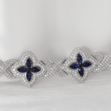 14K White Gold Round Lab Diamond Bracelet with Pear Lab Sapphire – Art Nouveau Nature-Inspired  Eternal Fleur Blue Design 14K White Gold Round Lab Diamond Bracelet with Pear Lab Sapphire – Art Nouveau Nature-Inspired  Eternal Fleur Blue Design
