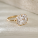 14K Yellow Gold 2.5ct Antique Emerald Cut Lab Diamond Ring with Tapered Step Cut Lab Diamond Halo 14K Yellow Gold 2.5ct Antique Emerald Cut Lab Diamond Ring with Tapered Step Cut Lab Diamond Halo
