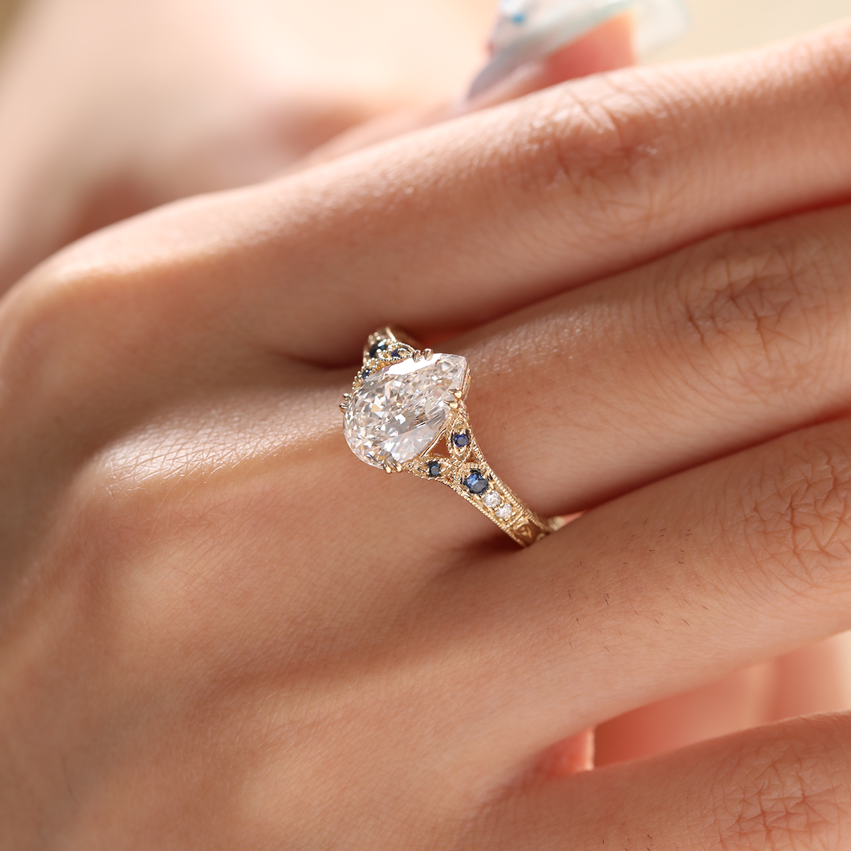 14K Yellow Gold 2.5ct Pear Lab Diamond with Round Lab Diamond and Lab Sapphire Side-stone Millegrain Floral Engraving Ring-Art Nouveau Nature-Inspired 14K Yellow Gold 2.5ct Pear Lab Diamond with Round Lab Diamond and Lab Sapphire Side-stone Millegrain Floral Engraving Ring-Art Nouveau Nature-Inspired