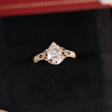 14K Yellow Gold 2.5ct Pear Lab Diamond with Round Lab Diamond and Lab Sapphire Side-stone Millegrain Floral Engraving Ring-Art Nouveau Nature-Inspired 14K Yellow Gold 2.5ct Pear Lab Diamond with Round Lab Diamond and Lab Sapphire Side-stone Millegrain Floral Engraving Ring-Art Nouveau Nature-Inspired