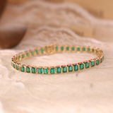 14K Yellow Gold Emerald Cut Lab Zambian Emerald Bezel Tennis Bracelet 14K Yellow Gold Emerald Cut Lab Zambian Emerald Bezel Tennis Bracelet