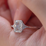 14K White Gold 1.5ct Radiant Cut Lab Diamond Three Stone Ring with Triangular Cut Lab Diamond Side Stones and Tapered Band Design