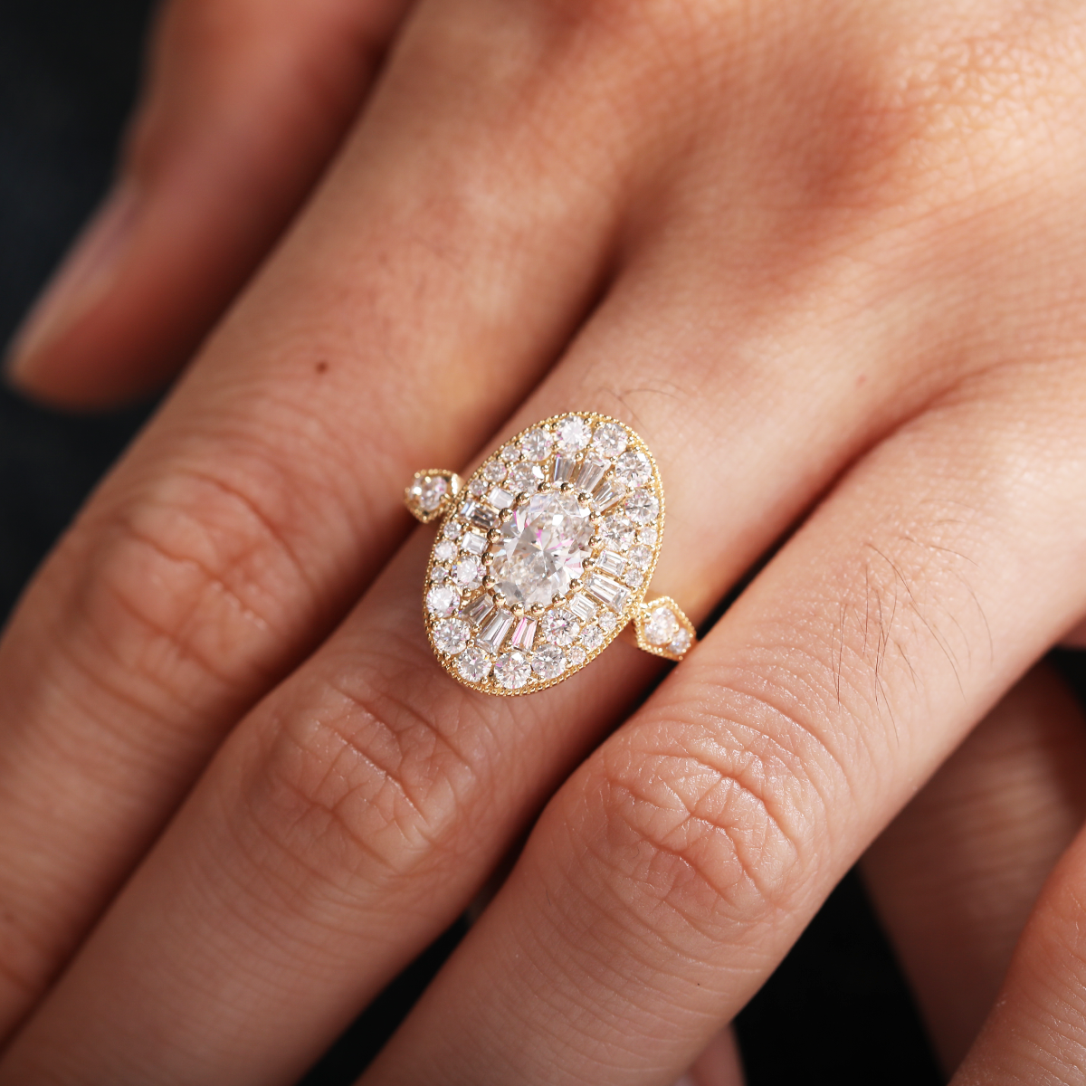 18K Yellow Gold Oval Lab Diamond Millegrain Vintage Style Ring with Round and Tapered Baguette Side-stones Halo