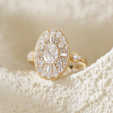 18K Yellow Gold Oval Lab Diamond Millegrain Vintage Style Ring with Round and Tapered Baguette Side-stones Halo