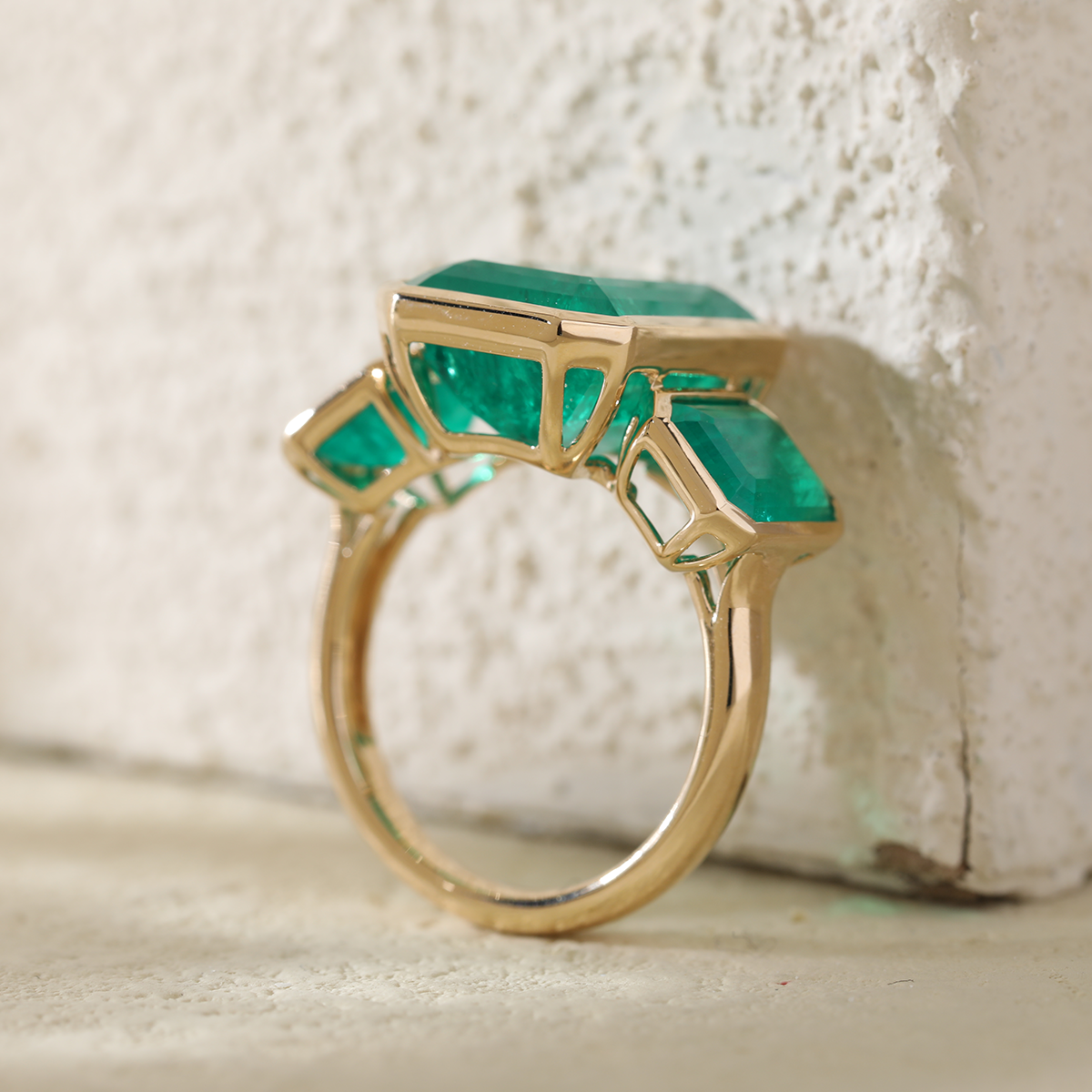 14K Yellow Gold 10.5 ct tw Emerald Cut Colombian Lab Emerald Bezel Setting Three-stone Ring