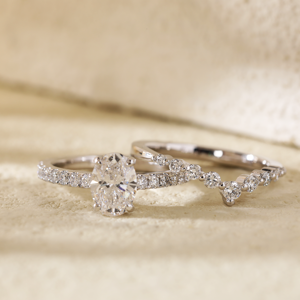Platinum 1ct Oval Cut Lab Diamond 4 Claw Prong Basket Setting Round Lab Diamond Pave Ring with A 7-stone Round Lab Diamond V-Shaped Ring Enhancer - Bridal Ring Set Design